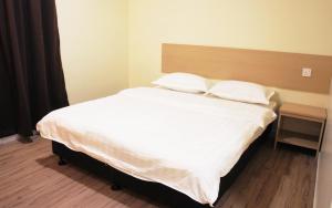 Postel nebo postele na pokoji v ubytování No.31 Maple Inn