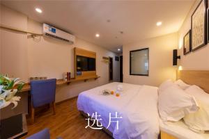 Letto o letti in una camera di 趣创酒店