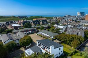 an aerial view of a small town with houses at Appartement Greenlön in Westerland (Sylt)