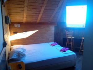 Postel nebo postele na pokoji v ubytování Rony Hotel + 29 fotografií