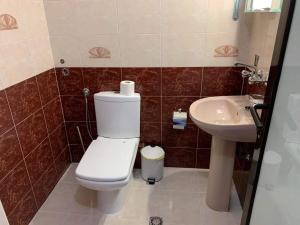 Koupelna v ubytování Rony Hotel