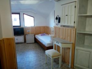 Postel nebo postele na pokoji v ubytování Rony Hotel