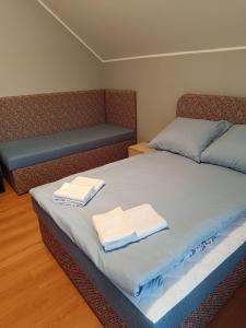 Postel nebo postele na pokoji v ubytování Bursztynowa 2
