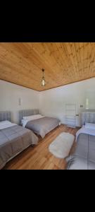 Postel nebo postele na pokoji v ubytování Samuel's Rooms