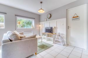 TV a/nebo společenská místnost v ubytování Le Cottage - Confort - Calme - Lumineux