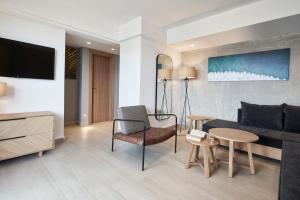 TV a/nebo společenská místnost v ubytování Atlantica Caldera Palace