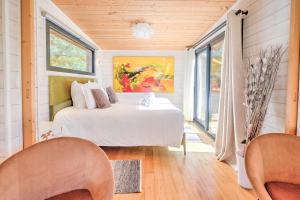 Katil atau katil-katil dalam bilik di Lodge Bruyère, Vue d'Exception +19 gambar