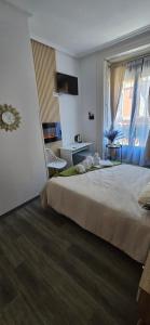 Łóżko lub łóżka w pokoju w obiekcie Habitaciones Universal