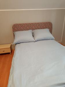 Postel nebo postele na pokoji v ubytování Bursztynowa 2