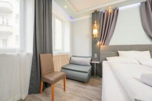Posezení v ubytování Palais Pálffy Apartments Vienna