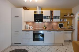 Foto dalla galleria di Ferienwohnung Alpina a Rosshaupten Altre 17 foto