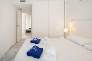 Postel nebo postele na pokoji v ubytování Coloso Sunset Beach by Alfresco Stays + 25 fotografií