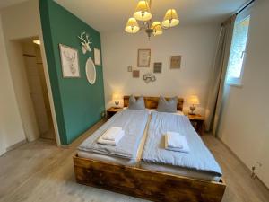 Postel nebo postele na pokoji v ubytování Kursaal Arosa - adults only
