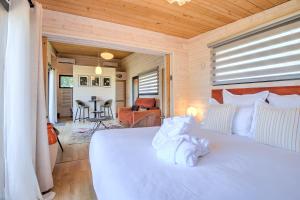 Katil atau katil-katil dalam bilik di Évasion au Lodge Dune +21 gambar