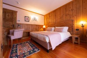 Postel nebo postele na pokoji v ubytování Hotel Bouton d'Or - Courmayeur