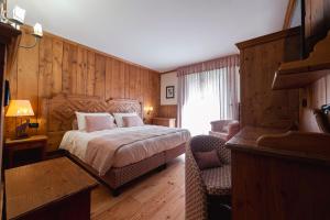 Postel nebo postele na pokoji v ubytování Hotel Bouton d'Or - Courmayeur