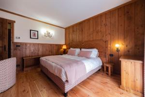 Postel nebo postele na pokoji v ubytování Hotel Bouton d'Or - Courmayeur