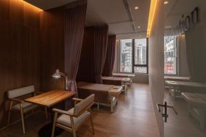 Zona de estar de In Joy Hotel