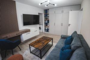 Μια τηλεόραση ή/και κέντρο ψυχαγωγίας στο Apartament Iulia si Alex