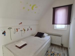 Posteľ alebo postele v izbe v ubytovaní Kuća za odmor Hodak