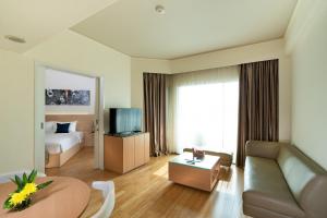 TV a/nebo společenská místnost v ubytování Cityloog Hotel Tebet Jakarta