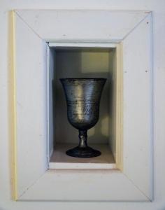 a black vase sitting inside of a box at Symi Uptown Carmine in Symi