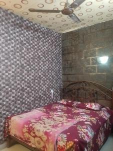 Postel nebo postele na pokoji v ubytování Sachin cottage