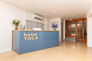 a hotel vla lobby with a hotel yoda sign at Hotel Yola in Altafulla