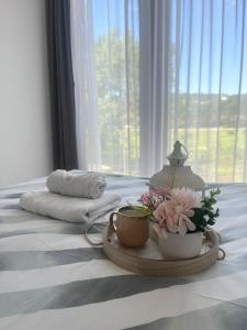 Ένα ή περισσότερα κρεβάτια σε δωμάτιο στο Apartman Borovi 14
