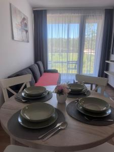 Posezení v ubytování Apartman Borovi 14
