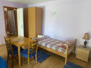 Postel nebo postele na pokoji v ubytování Vila Konstantinović