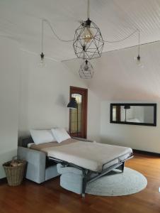 a bedroom with a bed in a room at La casa di Ottavio in Giaveno