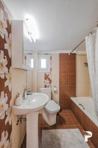 Ένα μπάνιο στο P Deluxe Suites A3