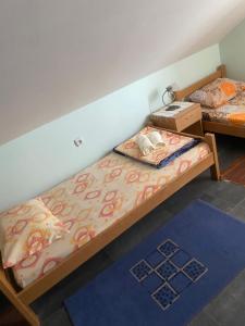 Postel nebo postele na pokoji v ubytování Vila Konstantinović