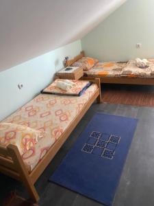 Postel nebo postele na pokoji v ubytování Vila Konstantinović