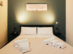 Postel nebo postele na pokoji v ubytování HUB Rooms