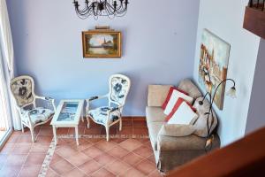 a living room with a couch and two chairs at SEAVIEW Apartment with POOL in Gornji Orahovac +56 photos
