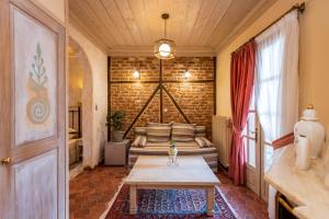 A bed or beds in a room at Dimatis