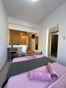Posteľ alebo postele v izbe v ubytovaní Papyrus City Centre Apartments