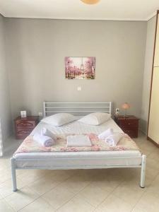 Postel nebo postele na pokoji v ubytování Olia Apartments S