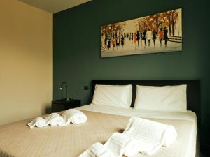 Postel nebo postele na pokoji v ubytování HUB Rooms