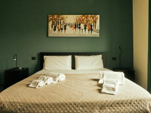 Postel nebo postele na pokoji v ubytování HUB Rooms