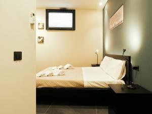 Postel nebo postele na pokoji v ubytování HUB Rooms