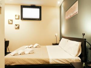 Postel nebo postele na pokoji v ubytování HUB Rooms