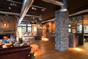 Lounge nebo bar v ubytování Boutique-Hôtel Chez Jan