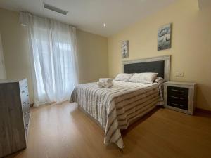 Un pat sau paturi într-o cameră la YourHouse Maca I +25 fotografii