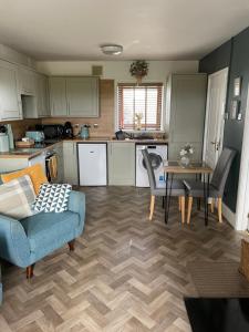 Kuchyň nebo kuchyňský kout v ubytování Dove cottage