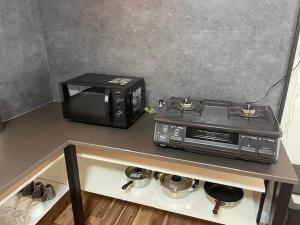 Fotografija u galeriji objekta 縁湯の宿 道後 u gradu Macujama