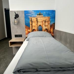 Postel nebo postele na pokoji v ubytování Rimedya Hotel - an der Messe München