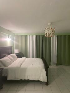 A bed or beds in a room at Seabliss Villa